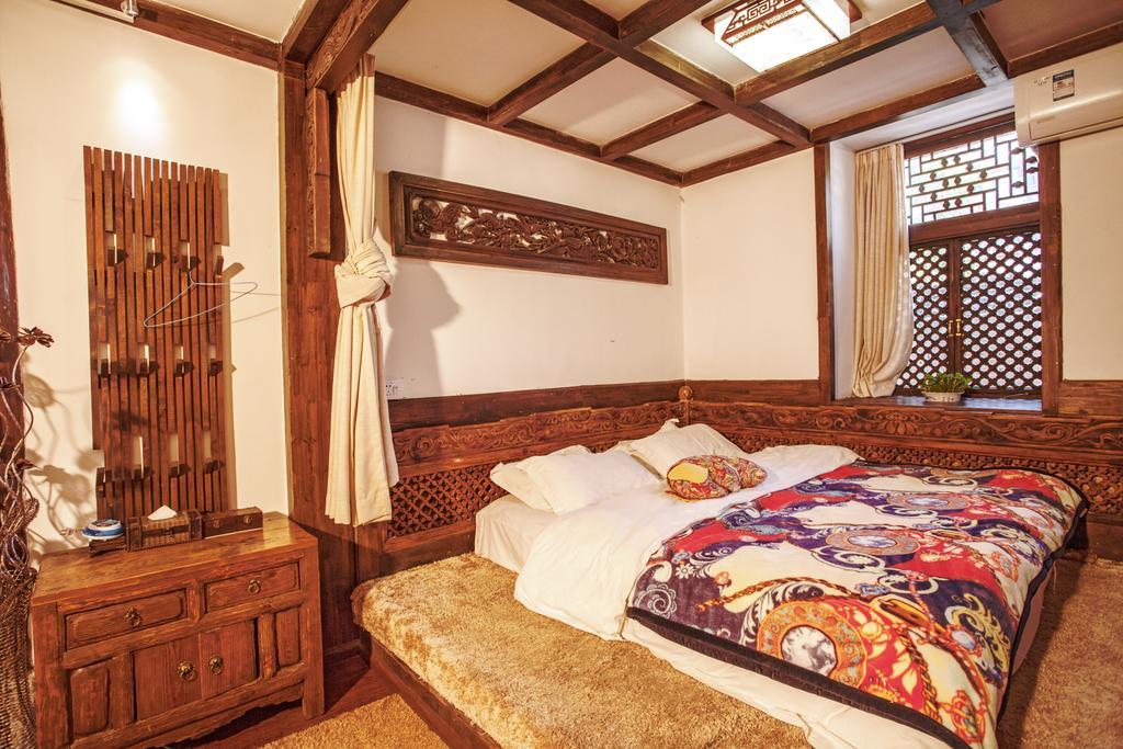 XI Tang Exquisite Hotel Лицзян Номер фото