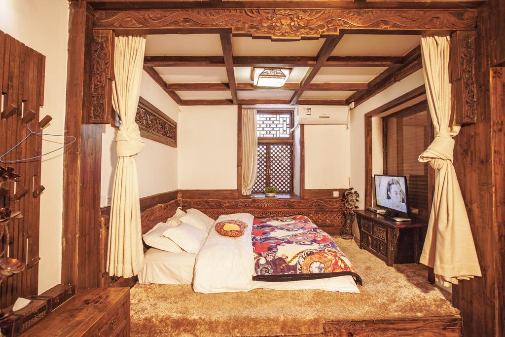XI Tang Exquisite Hotel Лицзян Номер фото