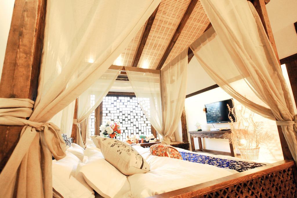 XI Tang Exquisite Hotel Лицзян Номер фото