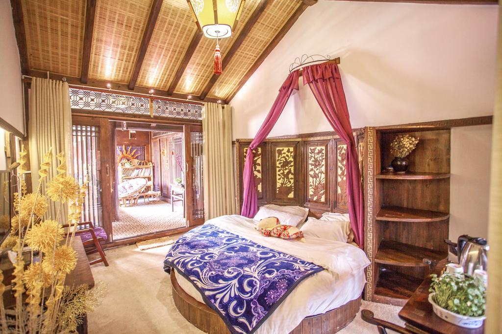 XI Tang Exquisite Hotel Лицзян Номер фото