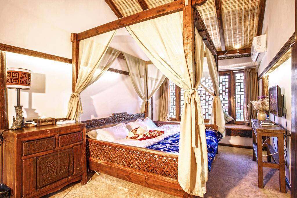 XI Tang Exquisite Hotel Лицзян Номер фото